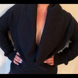 Black cowl neck sweater.